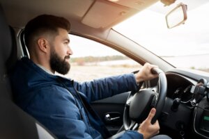 Driving a rental car on a Costa Rica highway road trip to Osa Peninsula
